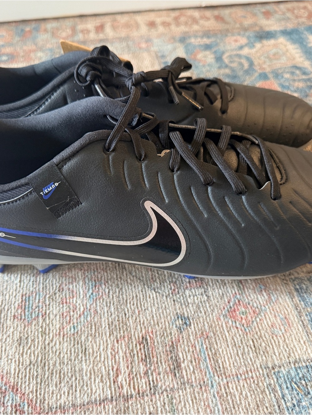 Nike Black Soccer Cleats with Silver and Blue Accents
